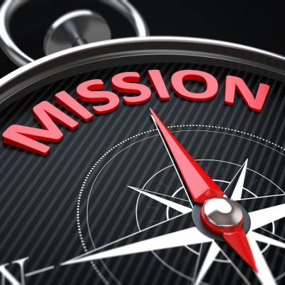 compass with the word mission