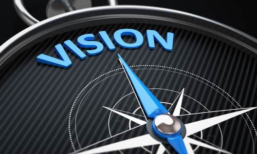 compass with the word vision