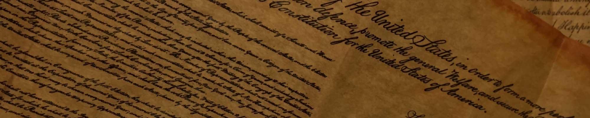 A zoomed in image of the Declaration of Independence.